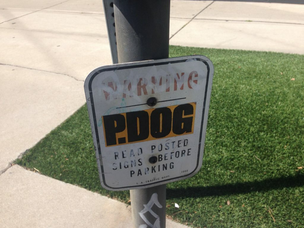 street sign p dog